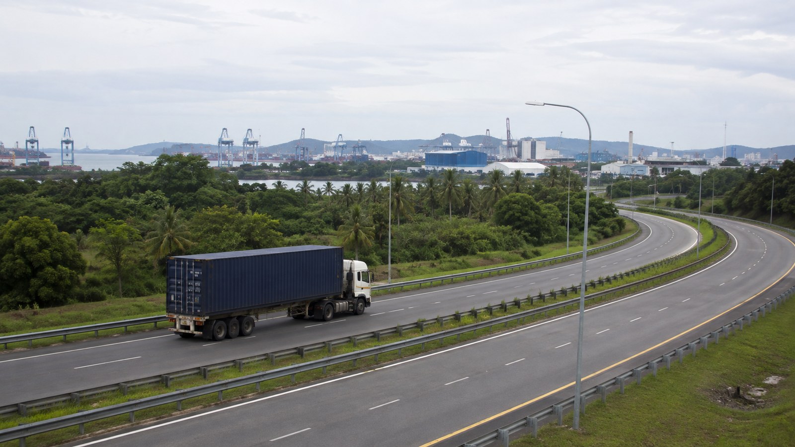 AI-generated illustration of a container truck on a tropical Malaysian port access road, representing Kuantan and Gebeng logistics
